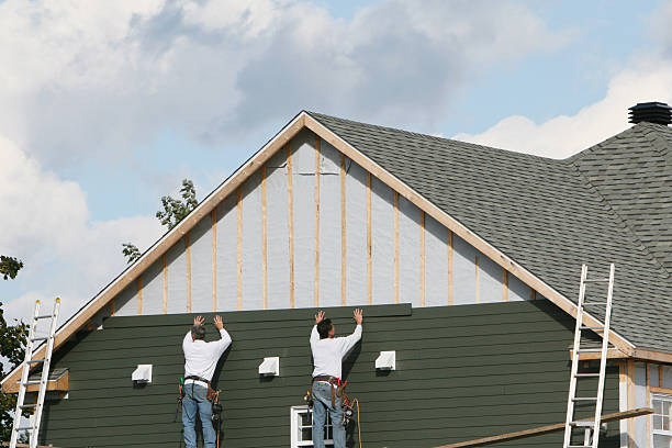 Professional Siding technician working in Clinton, OH